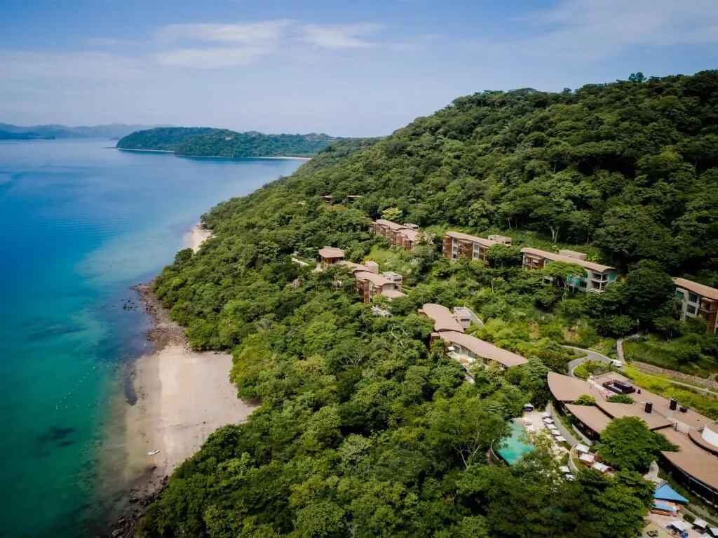 Aerial view of the Andaz resort along the forested Papagayo shoreline