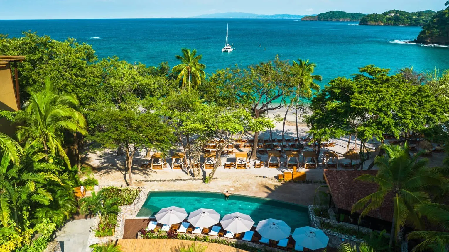 Pool terrace and turquoise bay at the Four Seasons on Peninsula Papagayo