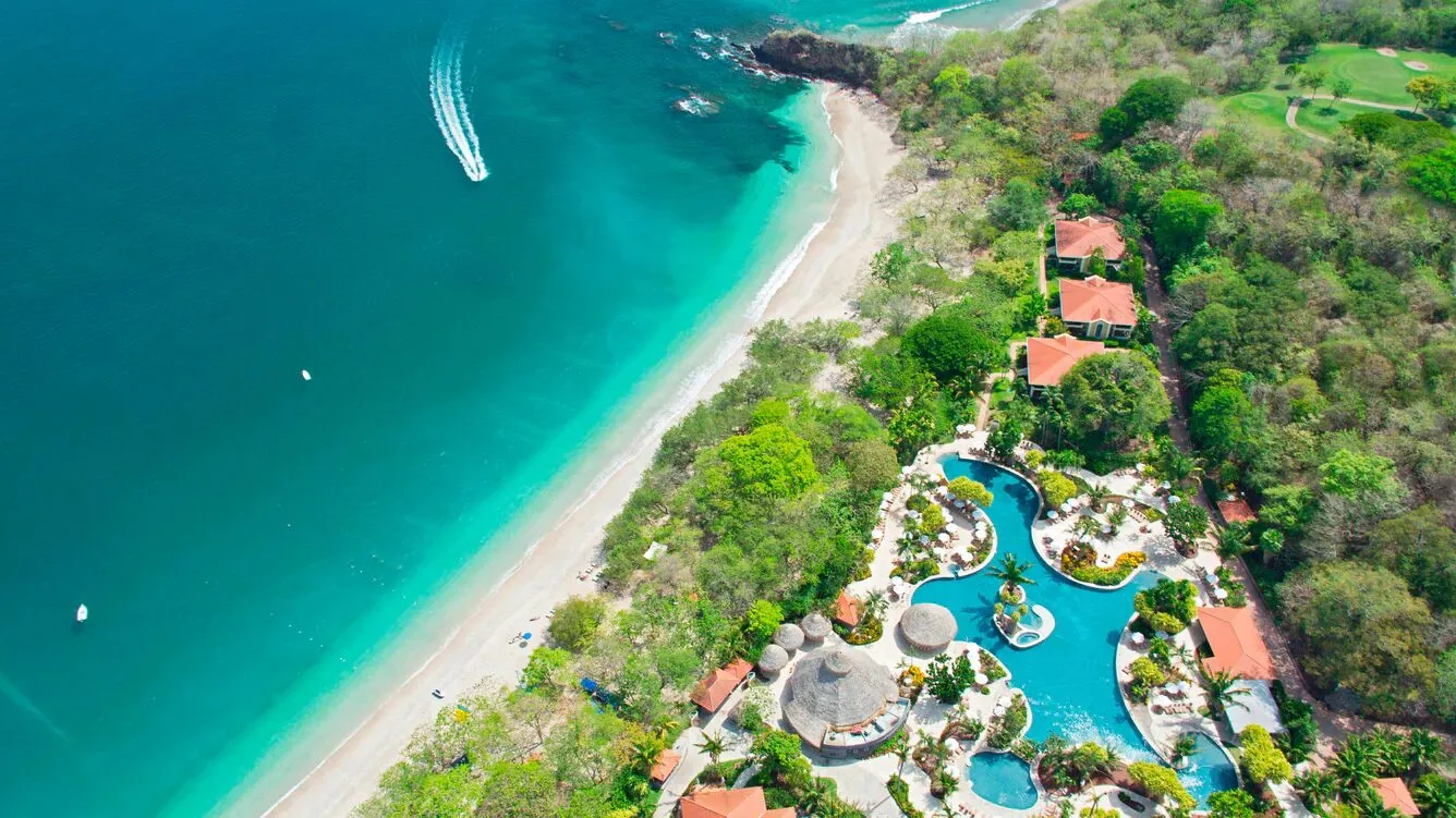 Aerial view of The Westin Reserva Conchal beside the beach